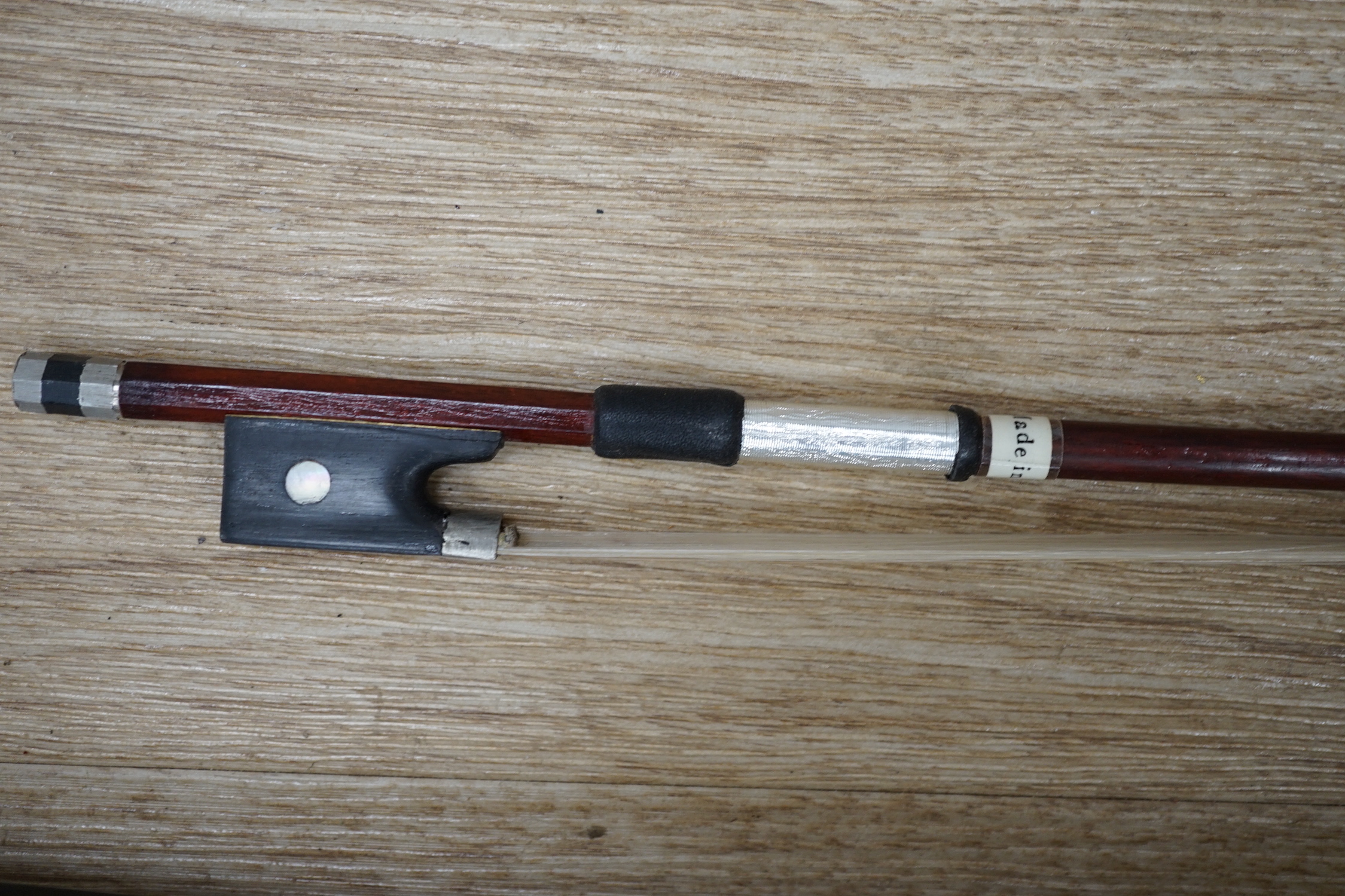 A 1920s Phono-fiddle by Jedson, with chrome horn and bow with simulated ivory tip, overall length 89cm